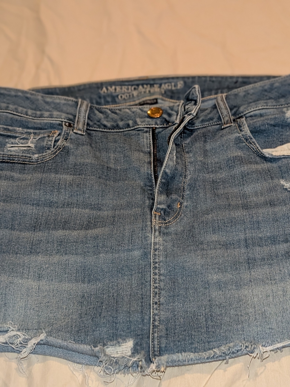 American Eagle Outfitters Light Blue Distressed Denim Mini Skirt